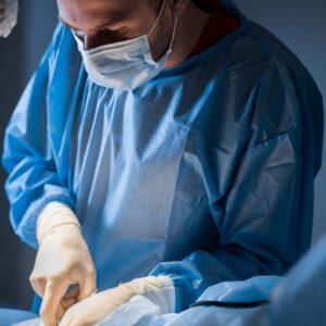Vascular surgeon in surgery