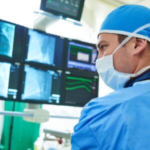 Vascular surgeon looking at scans