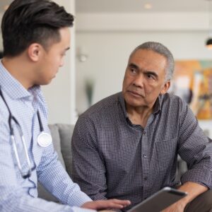 man consulting with doctor
