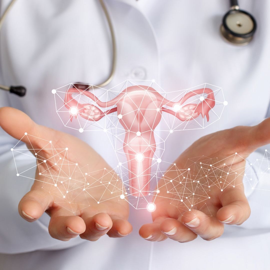 doctor with graphic of uterus